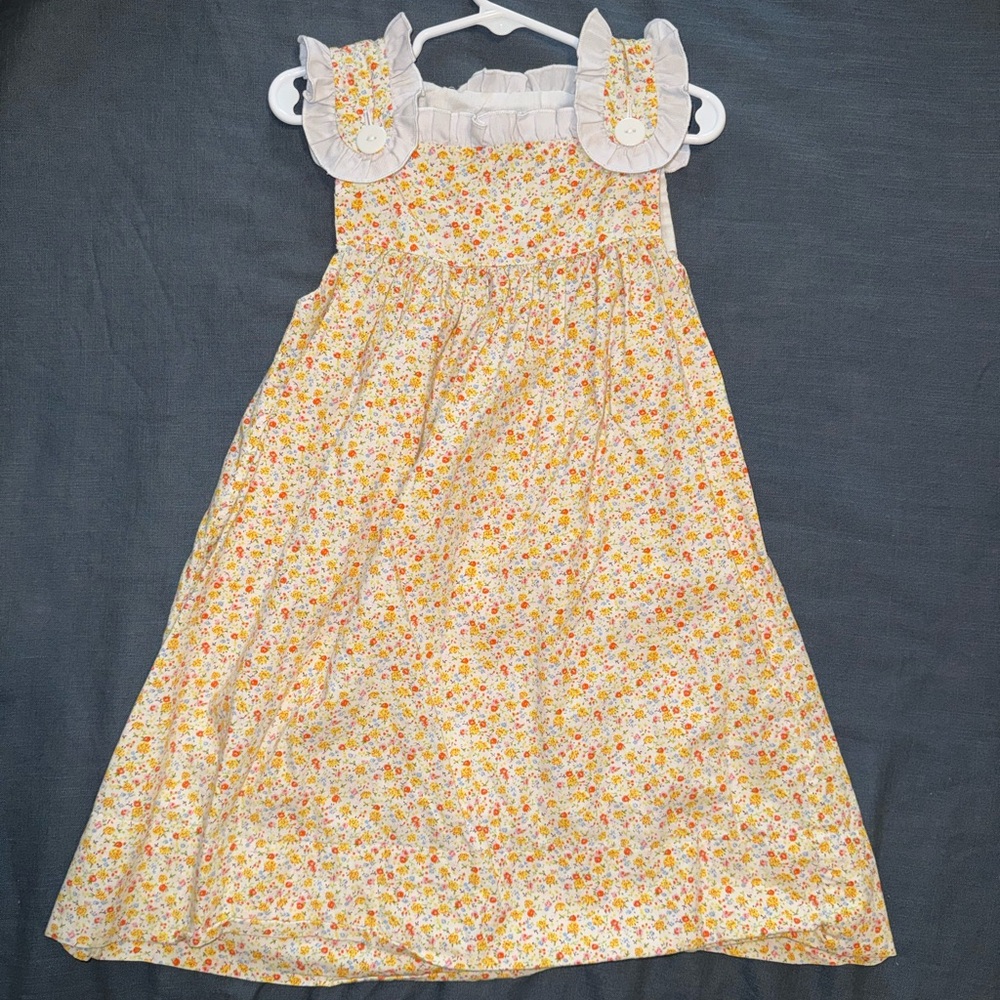 The Smocking Bug Orange & Yellow Floral Ruffled Sleeveless Dress